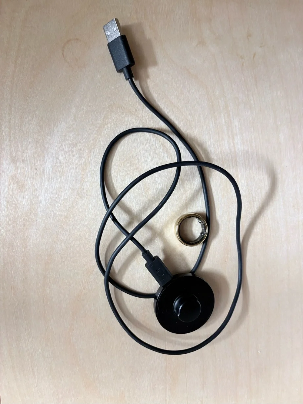 Oura Ring Charger with Gold Oura Ring